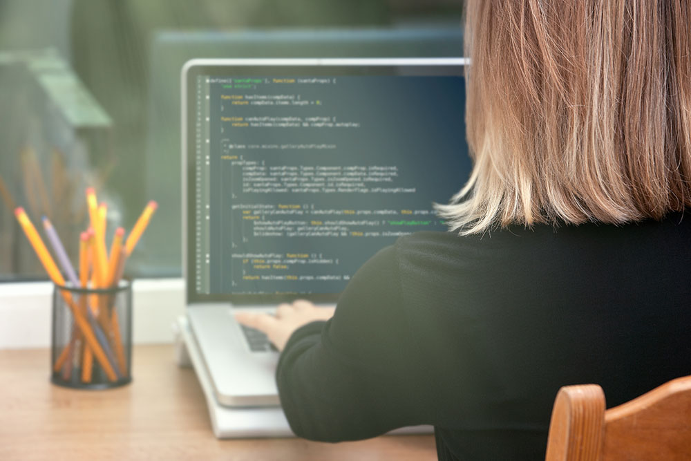 woman freelance programmer working from home.