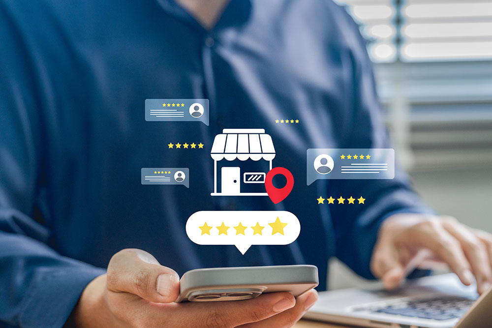 a review screen overlayed on top of a man sitting in an office using his phone